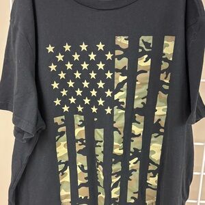 The American Flag Military style. Size XL. Short sleeve. 60/40 cotton/poly. EUC.
